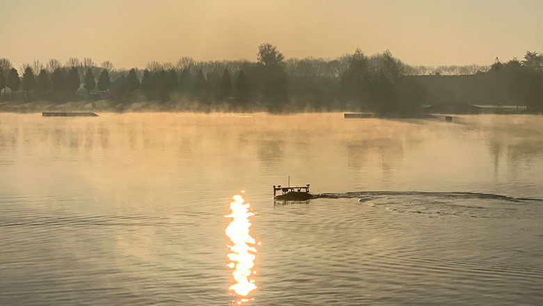 A USV performing a bathymetric survey of a shallow water lake while on a pre-programmed autopilot mission